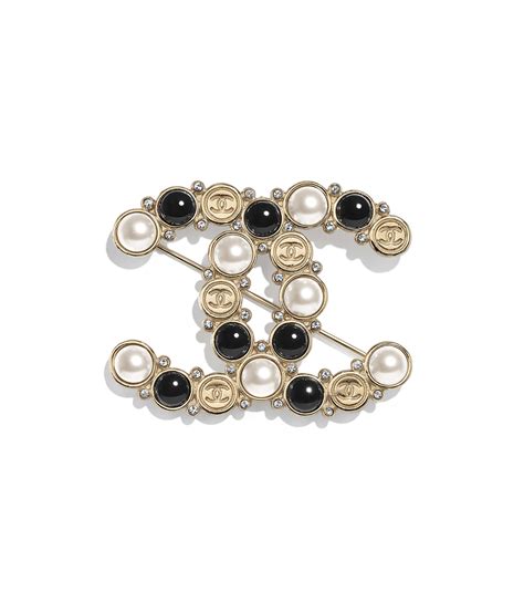 Chanel costume brooches